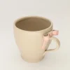 Beige Kopje Met Strik