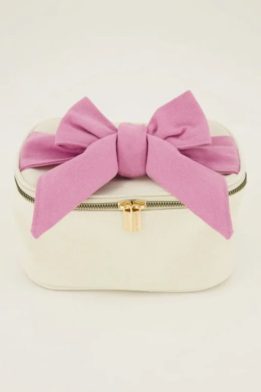 Beige Toilettas Met Roze Strik