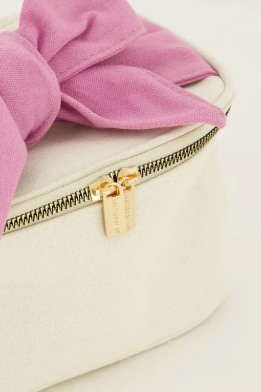 Beige Toilettas Met Roze Strik