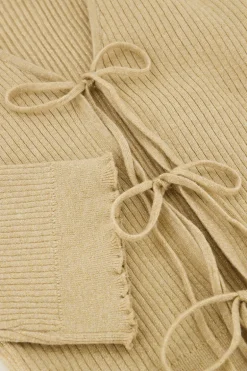 Beige Vestje Met Lurex & Strikjes