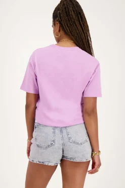 Blauwe Denim Skort Met Overslag En Roze Gloed