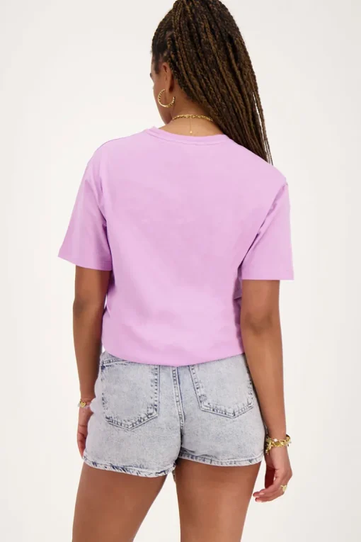 Blauwe Denim Skort Met Overslag En Roze Gloed