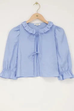 Blauwe Top Met Strikjes En Ruffle Kraag