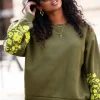 Groene Sweater Met Geborduurde Mouwen