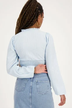 Lichtblauwe Crop Top Met Ruffles En Smock