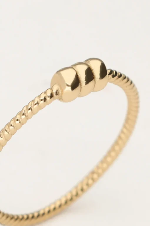 Minimalistische Ring Met Structuur En Drie Bolletjes