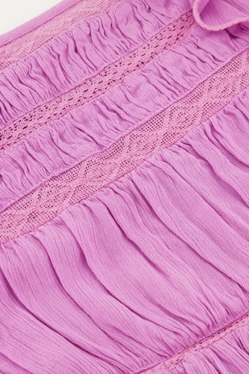 Paarse Top Met Lange Mouwen Met Tapes En Ruffles