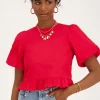 Rode Blouse Met Pofmouwen En Strikjes Aan Achterzijde