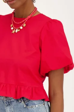 Rode Blouse Met Pofmouwen En Strikjes Aan Achterzijde