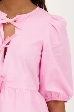 Roze Top Met Strikjes En Pofmouwen