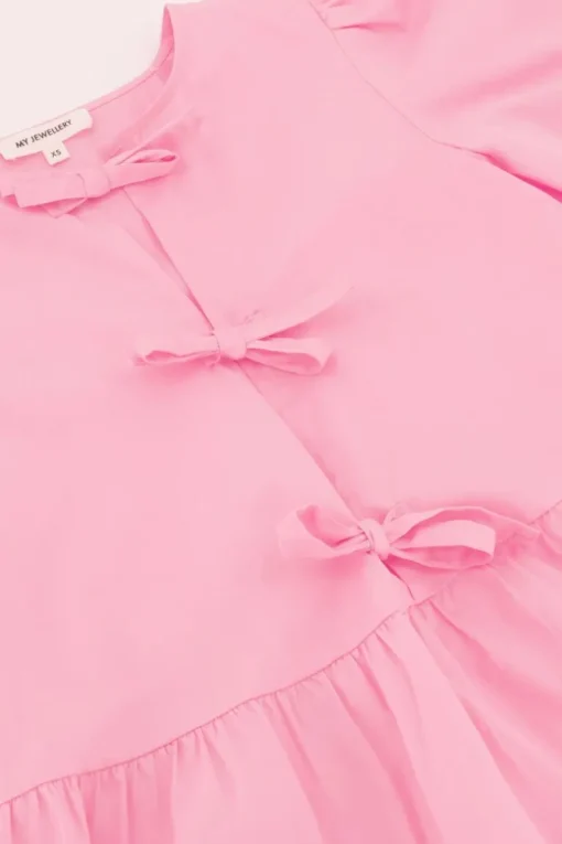 Roze Top Met Strikjes En Pofmouwen