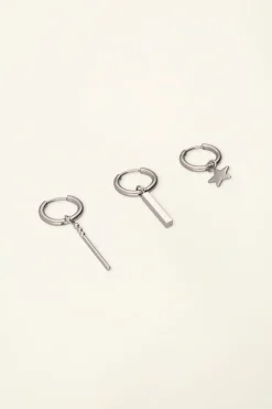 Set Van Drie Oorringen Met Ster