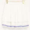 Witte Rok Met Blauwe Embroidery Rand