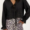 Zwarte Blouse Met Strikjes En Broderie